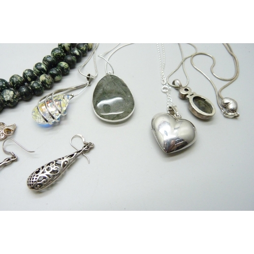 900 - A collection of silver jewellery, etc., including a hallmarked silver ring set with moss agate, size... 