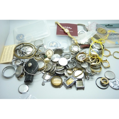 913 - A collection of watch parts