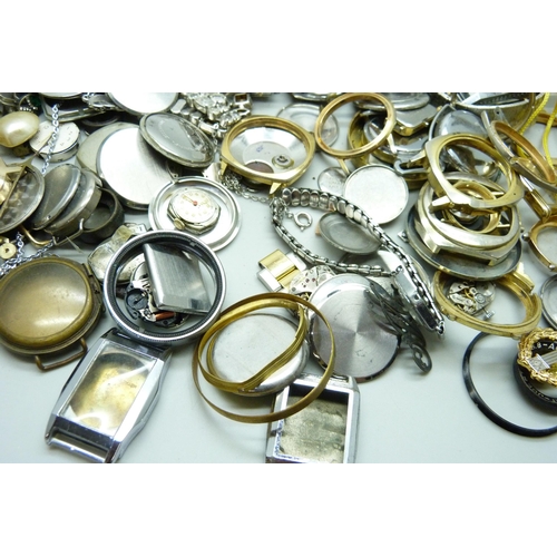 913 - A collection of watch parts