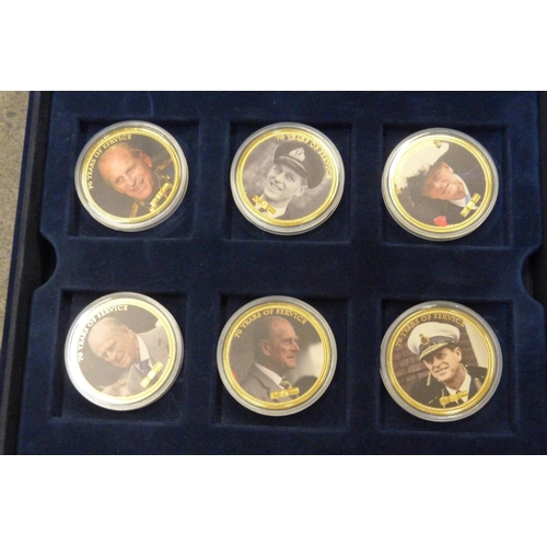 929 - Three cased sets of gold plated and enamelled coins, Duke of Edinburgh, William and Kate and London ... 