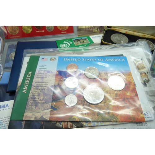 932 - Assorted coins, coin packs including Beatrix Potter 50p coin display