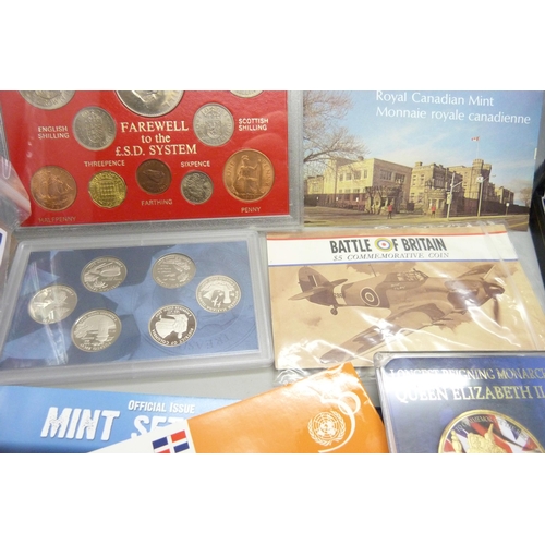 932 - Assorted coins, coin packs including Beatrix Potter 50p coin display