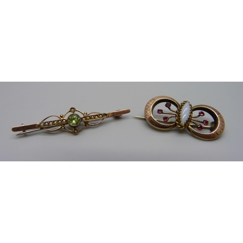 941 - Two 9ct gold brooches, one set with red stones and opal, one lacking a seed pearl, 4.6g