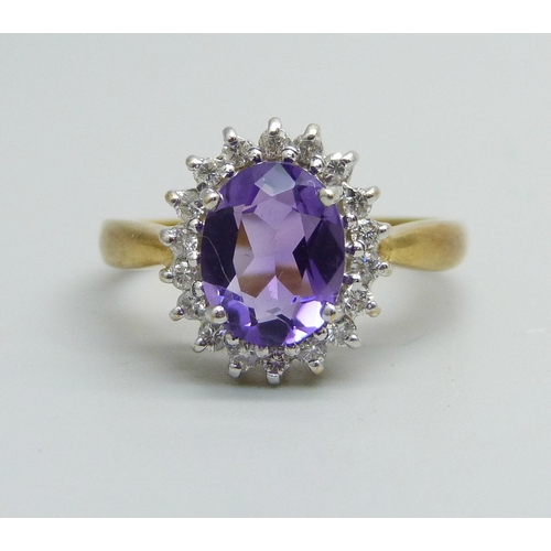 942 - An 18ct gold, amethyst and diamond cluster ring, 4.5g, Q