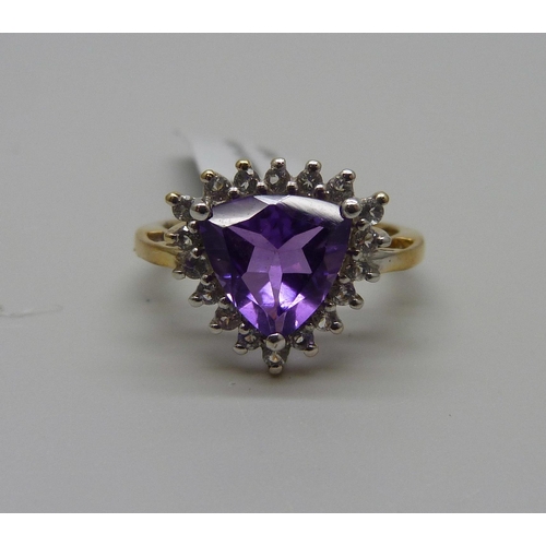 943 - A silver gilt amethyst and white topaz ring, R/S