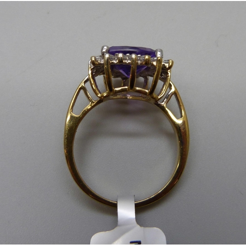 943 - A silver gilt amethyst and white topaz ring, R/S