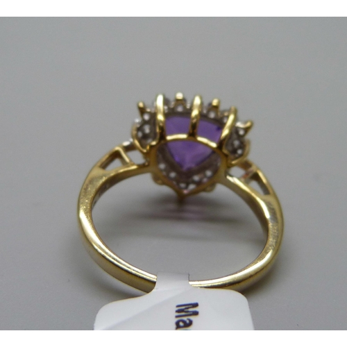 943 - A silver gilt amethyst and white topaz ring, R/S