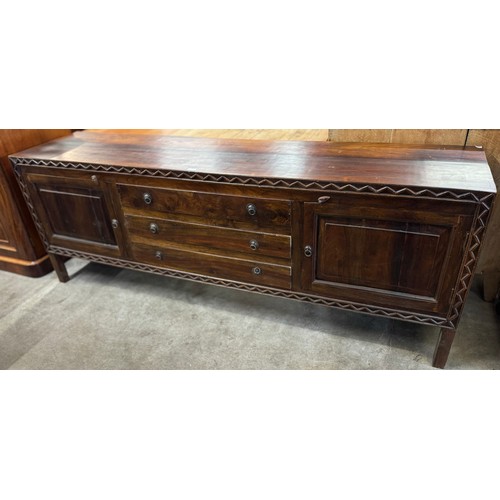 167 - A French style carved hardwood sideboard