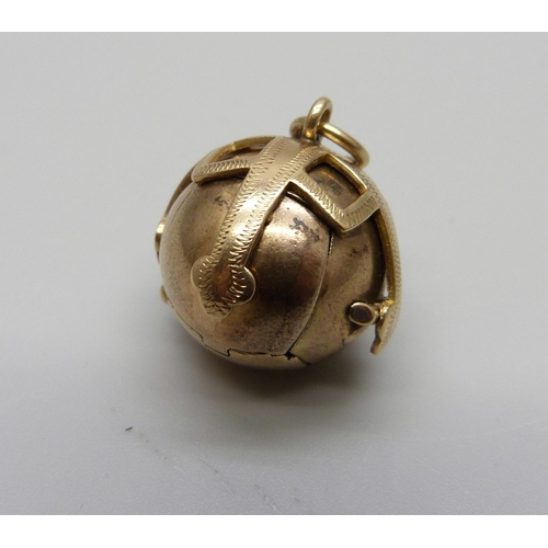 953 - A Masonic ball pendant, marked JHW and made in England