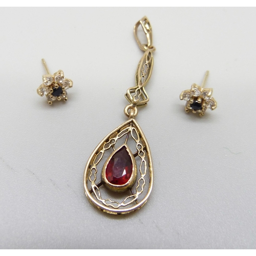 954 - A 9ct gold drop pendant and a pair of 9ct gold earrings, 1.6g