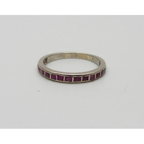 956 - A ruby set half eternity ring, 2.5g, O, (tests as high carat gold)