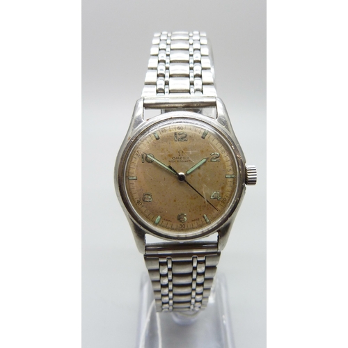 966 - A 1940s/50s stainless Omega wristwatch with luminous hands, 31mm case