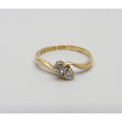 976 - An 18ct gold diamond set crossover ring, Chester, circa 1900, 1.8g, O