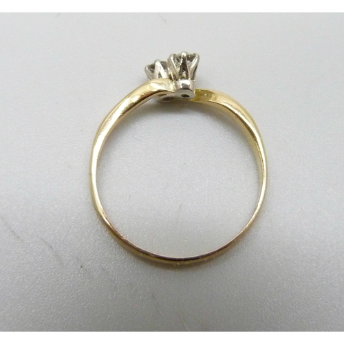 976 - An 18ct gold diamond set crossover ring, Chester, circa 1900, 1.8g, O