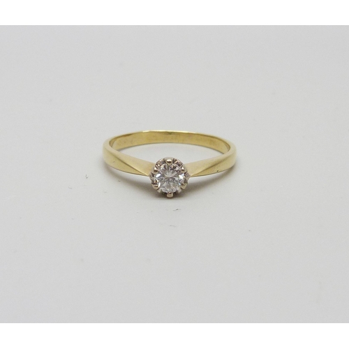 977 - An 18ct gold diamond solitaire ring, 3.4g, R