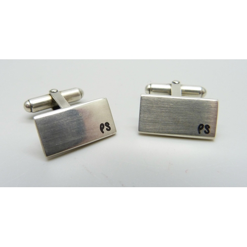 987 - A pair of Paul Smith silver cufflinks