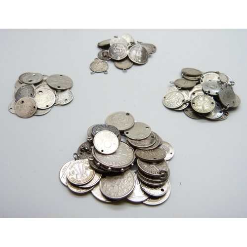 993 - A collection of silver British coins, Victorian and later, 107g, also some world coins, some silver,... 