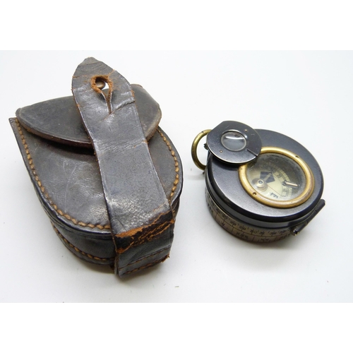 999 - A S. Smith & Son Ltd. London prismatic compass with leather case