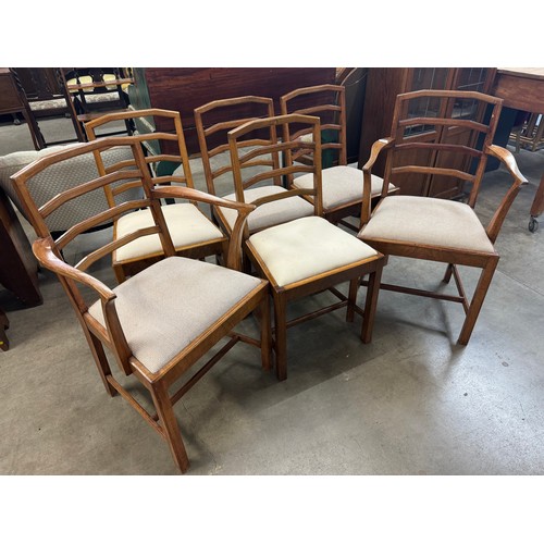 239 - A set of six Heals Art Deco oak dining chairs