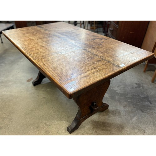 176 - An early 20th Century oak refectory table