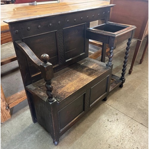 244 - An early 20th Century carved oak barleytwist hallseat