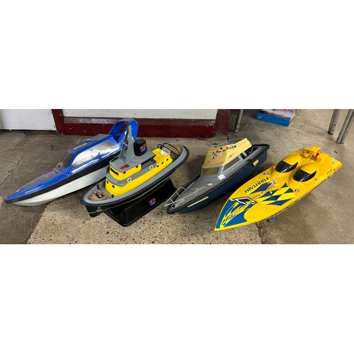 102 - Four remote control model power boats