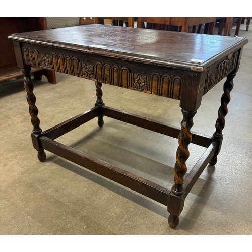 245 - A 17th Century style oak barleytwist side table