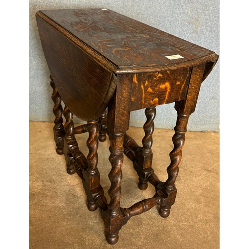 135 - A 17th Century style oak barleytwist gateleg table