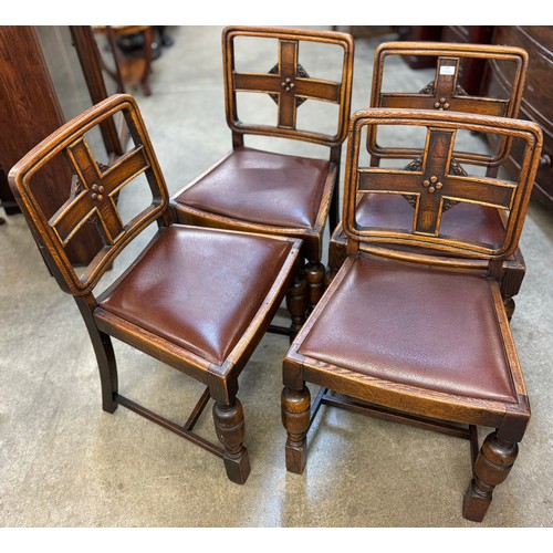 184 - A set of four early 20th Century oak dining chairs