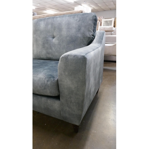 1423 - A teal velvet two and a half seater sofa