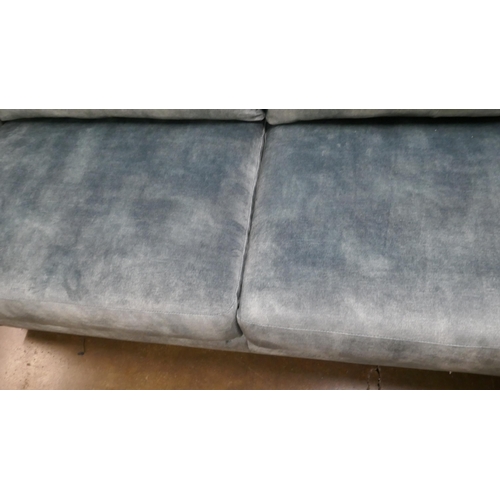 1423 - A teal velvet two and a half seater sofa