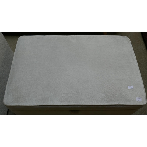 1557 - A large magnesium velvet footstool