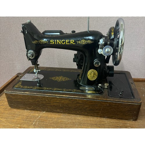 259 - A cased Singer sewing machine