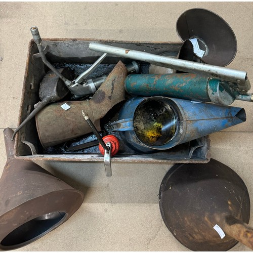 265 - An assortment of oil cans and funnels including a Rayes oil can