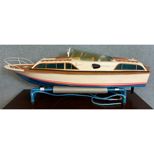 95 - A model Huntsman 31 power boat, designed for radio control, 90cms l