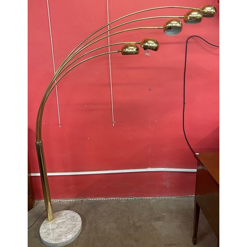 78 - An Italian style gilt metal floor standing arc lamp, on faux marble base