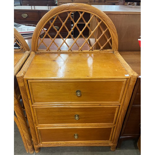 70 - A teak and bamboo four piece bedroom suite, comprising; chest of drawers, dressing table and pair of... 