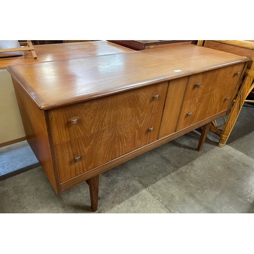 67 - A teak sideboard