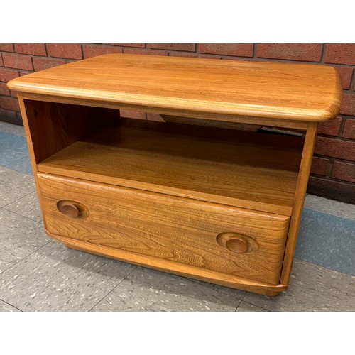 23F - An Ercol Blonde elm media cabinet