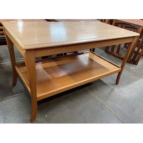 63 - A teak coffee table