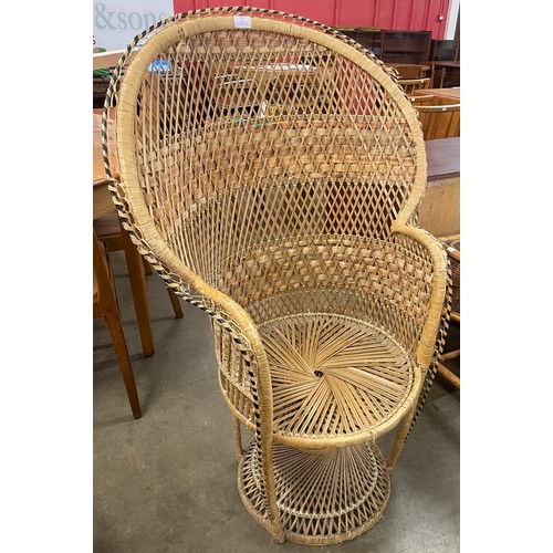 59 - An Italian wicker and rattan peacock chair