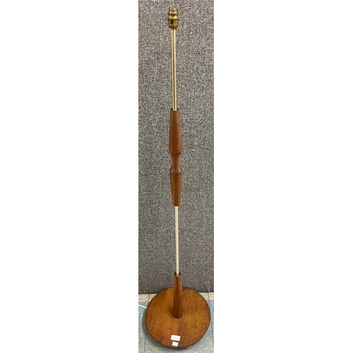 52 - A teak and brass standard lamp