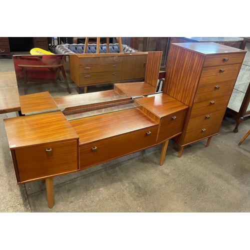 50 - An Avalon teak chest of drawers and dressing table