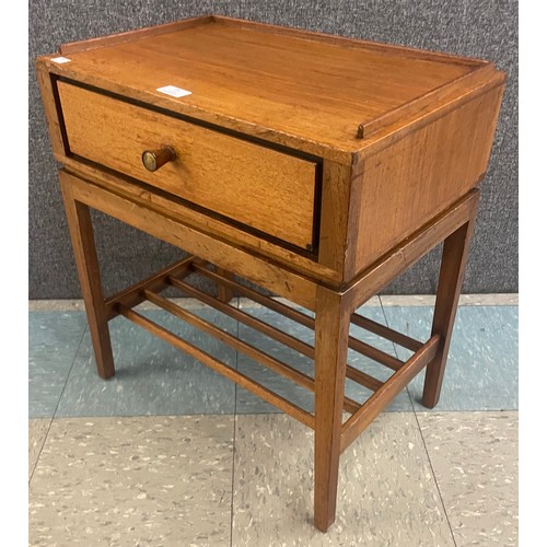 35 - A teak single drawer bedside table