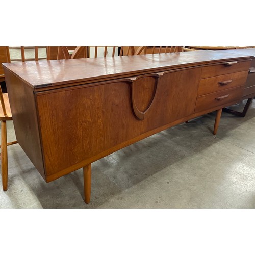 27 - A Beautility teak sideboard