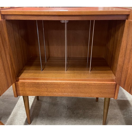 21 - A teak record cabinet