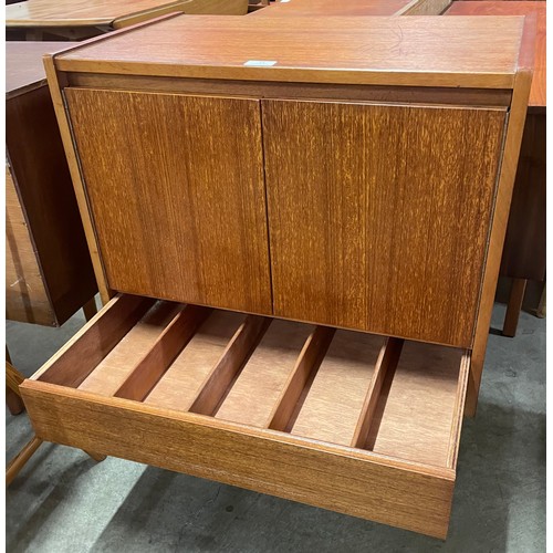 21 - A teak record cabinet