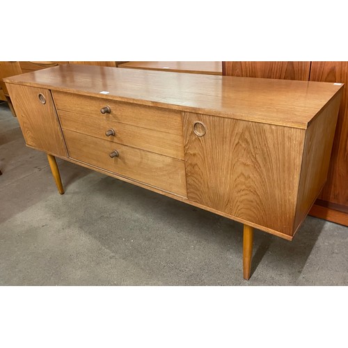 16 - An Avalon teak sideboard