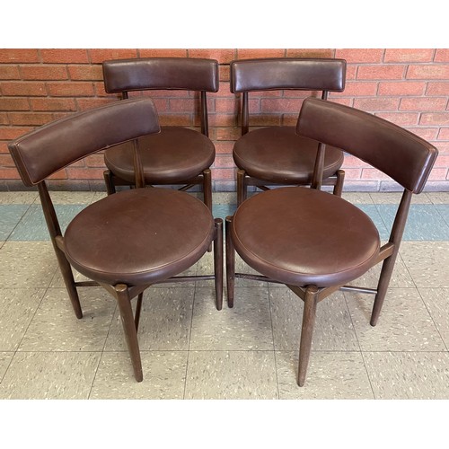 10 - A set of four G-Plan Fresco teak and brown vinyl dining chairs