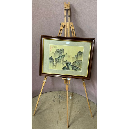 315 - A Japanese painting on silk, framed and an artists easel